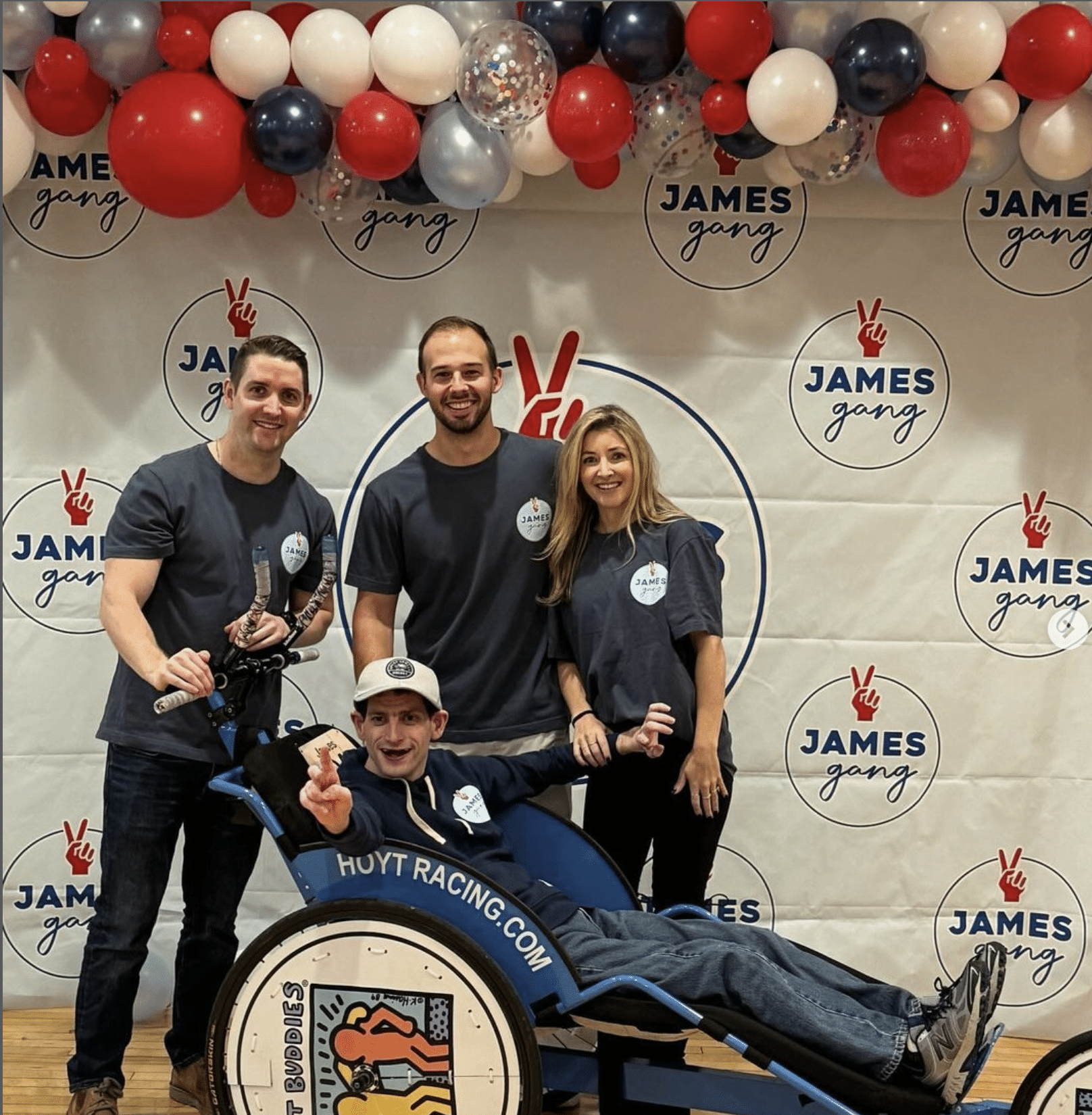 Members of the James Gang, with James in a Hoyt Racing wheelchair. The James Gang will run the Boston Marathon to raise money and awareness for NARS1 Gene Disorider.