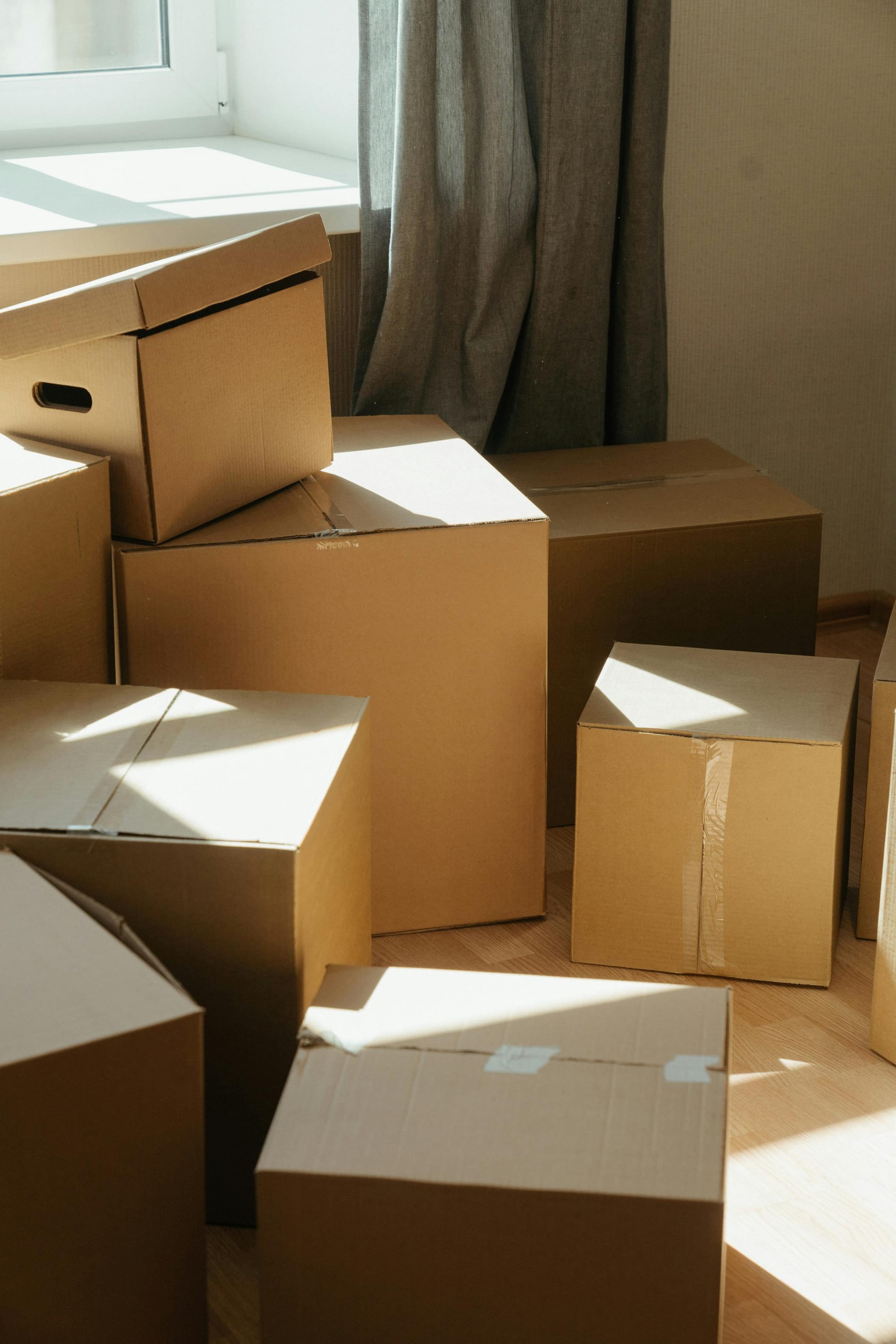 Brown Cardboard Boxes on White Ceramic Tiles
<p>" class="wp-image-8793"><figcaption class=